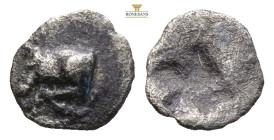Thraco-Macedonian Region, uncertain mint AR Hemiobol. (0.31g, 8.6mm) Circa 500-450 BC. . Forepart of bull left; HΛ(?) at truncation / Quadripartite sq...