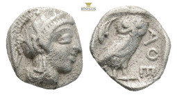 Attica, Athens AR Obol. Circa 454-404 BC. (0.63g, 9.2mm) Head of Athena to right, wearing earring, necklace, and crested Attic helmet decorated with t...