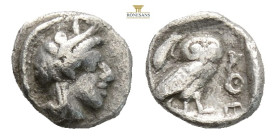 Attica, Athens AR Hemiobol. Circa 510-490 BC. (0.33g, 7.4mm) Helmeted head of Athena to right / Owl standing to left, head facing, olive sprig behind,...