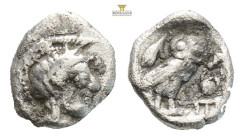 Attica, Athens AR Hemiobol. Circa 510-490 BC. (0.32g, 7.3mm) Helmeted head of Athena to right / Owl standing to left, head facing, olive sprig behind,...