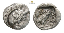 Attica, Athens AR Hemiobol. Circa 510-490 BC. (0.34g, 6.7mm) Helmeted head of Athena to right / Owl standing to left, head facing, olive sprig behind,...