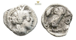 Attica, Athens AR Hemiobol. Circa 510-490 BC. (0.30g, 7.3mm) Helmeted head of Athena to right / Owl standing to left, head facing, olive sprig behind,...
