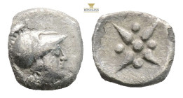 Asia Minor, uncertain mint (Kolone(?)) AR Hemiobol. (0.27g, 7.3mm) Circa 5th century BC. Head of Athena to right, wearing Corinthian helmet / Star or ...