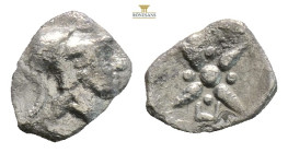 Asia Minor, uncertain mint (Kolone(?)) AR Hemiobol. (0.23g, 7.9mm) Circa 5th century BC. Head of Athena to right, wearing Corinthian helmet / Star or ...