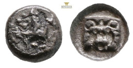 Asia Minor, Uncertain. 5th century BC. AR Hemiobol. (0.63g, 7.3mm). Chimaira lying right, with its forepart of stag left / Facing gorgoneion within in...