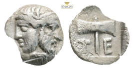 Islands off Troas, Tenedos AR Obol. Circa 5th Century BC. (0.44g, 8.9mm) Janiform head of female, facing left, and bearded male, facing right / Labrys...