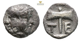 Islands off Troas, Tenedos AR Obol. Circa 5th Century BC. (0.49g, .9mm) Janiform head of female, facing left, and bearded male, facing right / Labrys,...