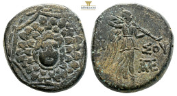 Pontos, Amisos. AE Circa 105-90 or 90-85 BC. (7.96g, 20.3mm) Aegis with gorgoneion / AΜΙ-ΣΟΥ, Nike advancing right, holding wreath and palm branch, be...