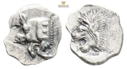 Mysia, Kyzikos AR Obol. Circa 450-400 BC. (0.87g, 11.2mm) Forepart of boar to left; E (retrograde) on shoulder, tunny fish upwards behind / Head of ro...