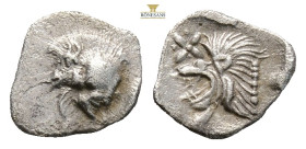 Mysia, Kyzikos AR Hemiobol. Circa 450-400 BC. (0.39g, 9.mm) Forepart of boar to left, tunny upward to right / Head of roaring lion to left star in upp...
