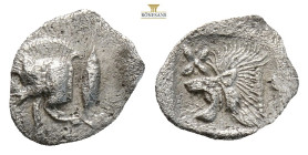 Mysia, Kyzikos AR Hemiobol. Circa 450-400 BC. (0.39g, 9.9mm) Forepart of boar to left, tunny upward to right / Head of roaring lion to left star in up...