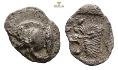 Mysia, Kyzikos AR Hemiobol. Circa 450-400 BC. (0.34g, 9.8mm) Forepart of boar to left, tunny upward to right / Head of roaring lion to left star in up...