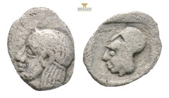 Mysia, Lampsakos(?) AR Tetartemorion. Circa 500-450 BC. (0.18g, 7.6mm) Head of Apollo to left, wearing taenia / Head of Athena to left, wearing Corint...