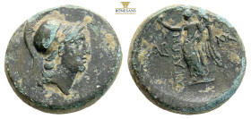 Aiolis, Aigai. Circa 2nd-1st century BC. AE (4.95g, 18.1mm) Helmeted head of Athena right / Nike advancing left, holding wreath and palm; AIΓAEΩN to l...