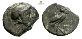 Aiolis, Neonteichos. Circa 3rd-2nd century BC. AE (0.74g, 9.5mm) Helmeted head of Athena to right / Owl standing to right, head facing, on NE monogram...