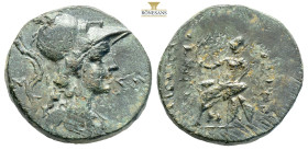 Pontus, Amisos. C. Caecilius Cornutus. Praetor, 56 BC. AE (8.80g, 24.9mm). Helmeted bust of Roma right / Roma seated left on shields, holding Nike. Ma...