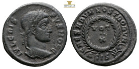 Crispus, as Caesar, AE Follis. Siscia, AD 321-324. (2.63g, 19.8mm) IVL CRISPVS NOB C, laureate head to right / CAESARVM NOSTRORVM, VOT•X in two lines ...