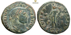 Constantius I, as Caesar, AE follis. Alexandria, AD 301. (6.50g, 25.5mm) FL VAL CONSTANTIVS NOB CAES, laureate head to right / GENIO POPVLI, Genius, w...