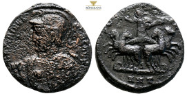 Maximinus II, as Caesar, Antioch, AE Follis. AD 310. MAXIMINVS NOB CAES, helmeted and cuirassed bust to left, holding spear over shoulder and shield d...