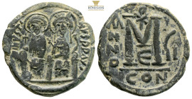 Justin II, with Sophia, AE 40 Nummi. Constantinople, (14.23g, 30.4mm) dated RY 6 = AD 570/1. D N IVSTINVS P P AV, Justin, on left holding globus cruci...