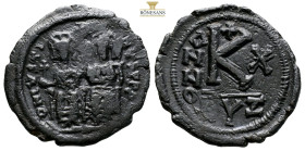 Justin II with Sophia. AE 20 Nummi. Cyzicus. AD 565-578. (5.35g, 25.2mm) D N IVSTINVS P P AV Justin, holding globus cruciger in his right hand, and So...