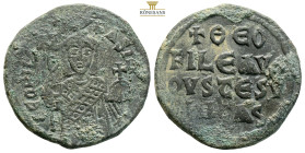 Theophilus. AE Nummi. Constantinople, AD 829-842. (8.97g, 28.1mm) [ΘЄOFIL] ЬASIL, three-quarter length bust facing, wearing loros, crown and tufa, hol...