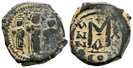 Heraclius, with Martina and Heraclius Constantine. AE Nummi. AD 610-641. (9.19g, 28mm) Constantinople. Heraclius, in center, flanked by Martina, on le...