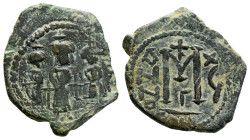 Heraclius, with Martina and Heraclius Constantine. AE Nummi. AD 610-641. (6.57g, 26.5mm) Constantinople. Heraclius, in center, flanked by Martina, on ...