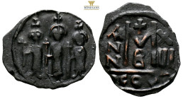 Heraclius, with Martina and Heraclius Constantine. AE Nummi. AD 610-641. (4.07g, 25.9mm) Constantinople. Heraclius, in center, flanked by Martina, on ...
