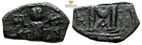 Heraclius, with Martina and Heraclius Constantine. AE Nummi. AD 610-641. (3.78g, 22.4mm) Constantinople. Heraclius, in center, flanked by Martina, on ...