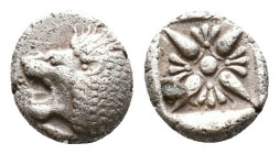 Ionia. Miletos circa 525-475 BC. Diobol AR Forepart of lion to right, his head turned back to left / Star-shaped floral ornament within incuse square....