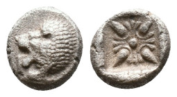 Ionia. Miletos circa 525-475 BC. Diobol AR Forepart of lion to right, his head turned back to left / Star-shaped floral ornament within incuse square....