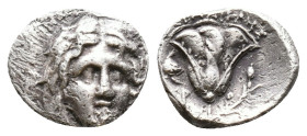 Islands off Caria. Rhodos circa 305-275 BC. Didrachm AR Head of Helios facing slightly right / POΔΙΟΝ above and Ε-Υ to left and right of rose with bud...