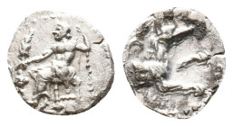 Lykaonia, Laranda AR Obol. Circa 324/3 BC. Baaltars seated left, holding grain ear, grape bunch, and scepter / Forepart of wolf right; inverted cresce...