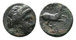 Gargara , Troas. c. late 3rd to early 2nd Century BC. Obv. Laureate head of Apollo right. Rev. Horse galloping right, ΓAP above, grape below. Conditio...