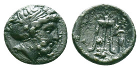 Mysia, Kyzikos. Circa 3rd century BC. AE. Head of Kore Soteira right, wreath with grain-ears. / K - Y / Ξ - I to sides of Tripod on tunny; grape-bunch...