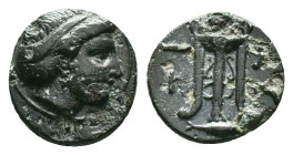 Mysia, Kyzikos. Circa 3rd century BC. AE. Head of Kore Soteira right, wreath with grain-ears. / K - Y / Ξ - I to sides of Tripod on tunny; grape-bunch...