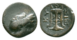 Mysia, Kyzikos. Circa 3rd century BC. AE. Head of Kore Soteira right, wreath with grain-ears. / K - Y / Ξ - I to sides of Tripod on tunny; grape-bunch...
