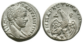 Elagabalus AR Tetradrachm of Antioch, Seleucis and Pieria. AD 218-222. ΑYΤ Κ Μ Α ΑΝΤѠΝЄΙ[ΝΟC CΕΒ], laureate head right, with slight drapery / [ΔΗΜΑΡΧ ...