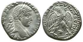 Elagabalus AR Tetradrachm of Antioch, Seleucis and Pieria. AD 218-222. ΑYΤ Κ Μ Α ΑΝΤѠΝЄΙ[ΝΟC CΕΒ], laureate head right, with slight drapery / [ΔΗΜΑΡΧ ...