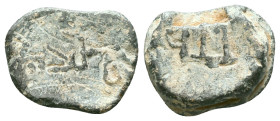 Islamic Lead Seals Reference : Condition: Very Fine 

Weight: 7,22 gr. Diameter: 18,7 mm