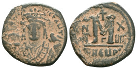 Maurice Tiberius Æ Nummus. Antioch, Dated RY 10 = 591-592 AD. d N mAURI C NP AUT, crowned facing bust, wearing consular robes, holding mappa and eagle...