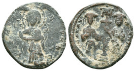 CONSTANTINE X DUCAS with EUDOCIA (1059-1067). Follis. Constantinople. Obv: + ЄMMANOVHΛ / IC - XC. Christ Pantokrator standing facing on footstool. Rev...