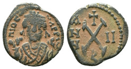Tiberius II Constantine, AD.578-582. AE
"Repatinated"

Reference : Condition: Very Fine

Weight: 2,62 gr. Diameter: 16,8 mm