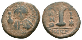 JUSTINIAN I.527-565 AD.Antioch mint.AE Decanummium. DN IVSTINIANVS PP AVG, helmeted, cuirassed bust facing, holding cross on globe and long sceptre, c...