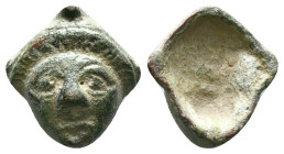 ANCIENT ROMAN BRONZE MASK.(Circa 1st-3rd century).Ae. Reference: Condition: Very Fine

Weight: 5,16 gr. Diameter: 19,0 mm