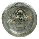 This is a circular, mold-pressed Byzantine glass token or seal, often referred to as a pilgrim token. 6th–8th century AD.These small devotional object...