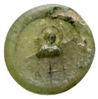 This is a circular, mold-pressed Byzantine glass token or seal, often referred to as a pilgrim token. 6th–8th century AD.These small devotional object...