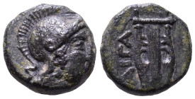 AEOLIS. Aegae. 3rd century BC. Obv: Helmeted head of Athena, right. Rev: AIΓA Lyre. Æ 11mm, 1,63g
