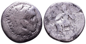 Uncertain AR Drachm. Obv: Head of Herakles to right, wearing lion skin headdress. Rev: ΑΛΕΞΑΝΔΡΟΥ Zeus Aëtophoros seated left, legs crossed. 16mm, 3,5...